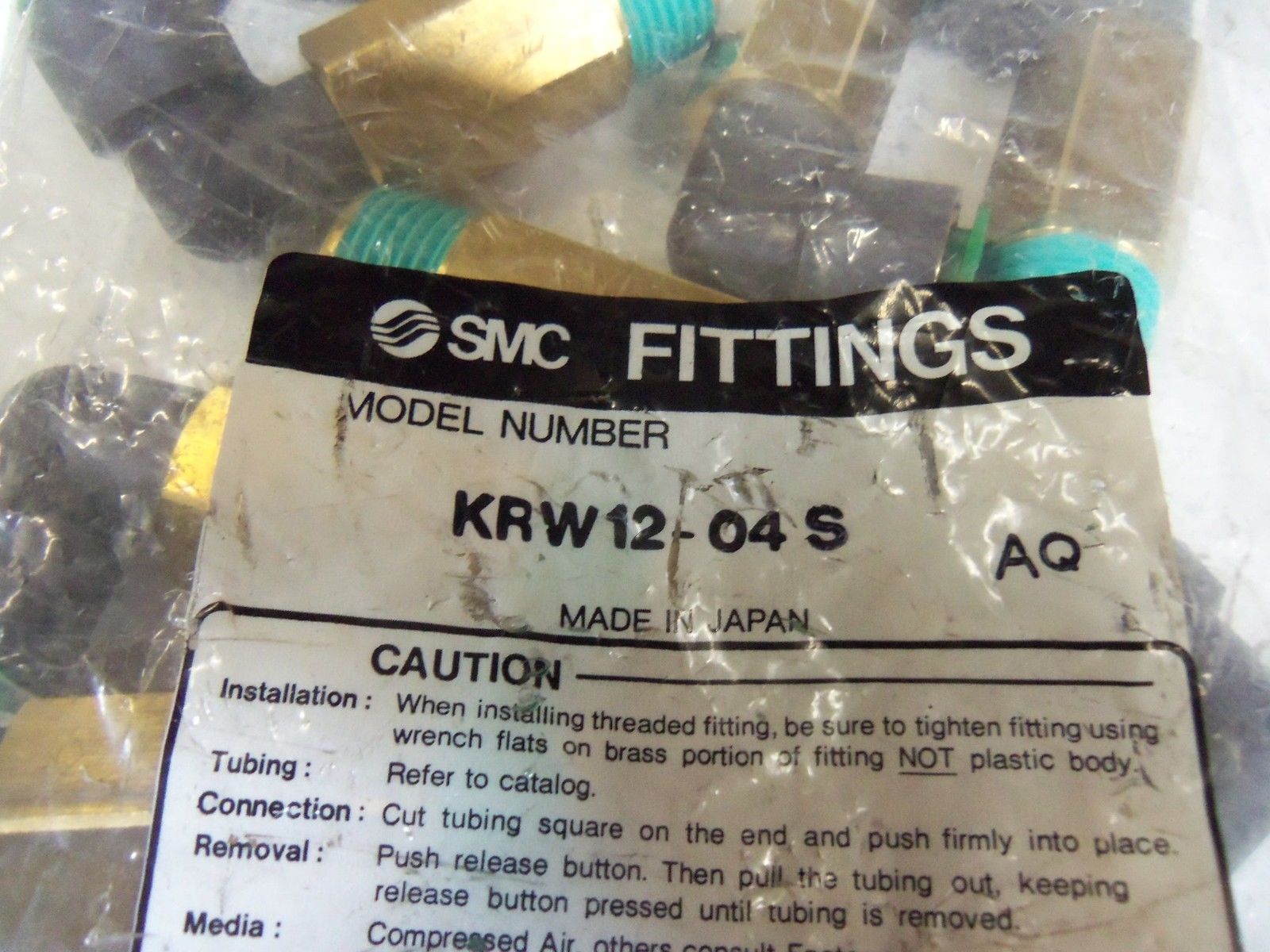 LOT OF 10  SMC FITTINGS KRW12-04S NSMP