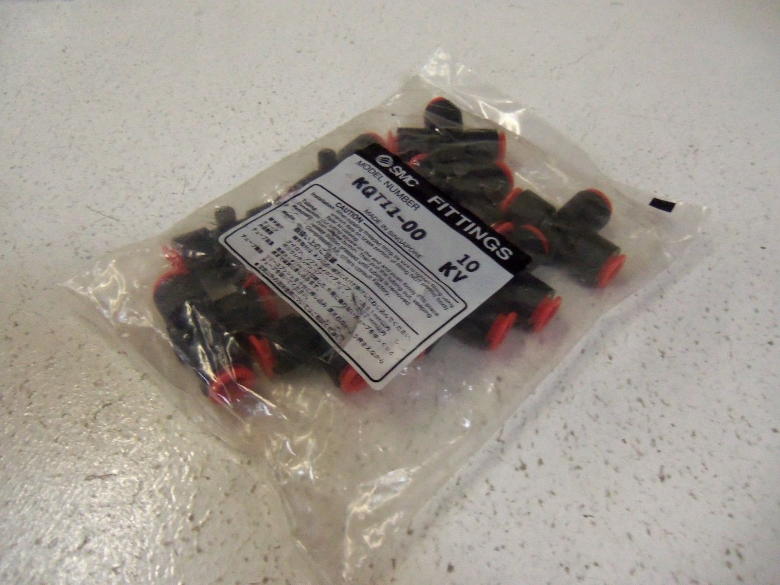 LOT OF 10 SMC FITTINGS KQT11-00 NSMP