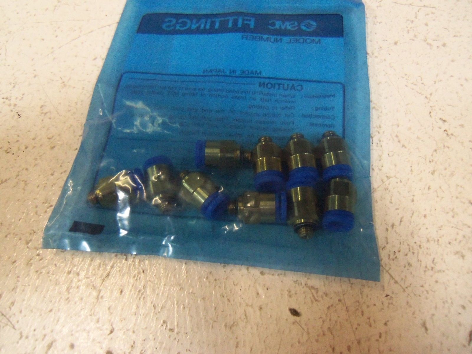 LOT OF 10  SMC FITTINGS KQH06-M5 NSMP