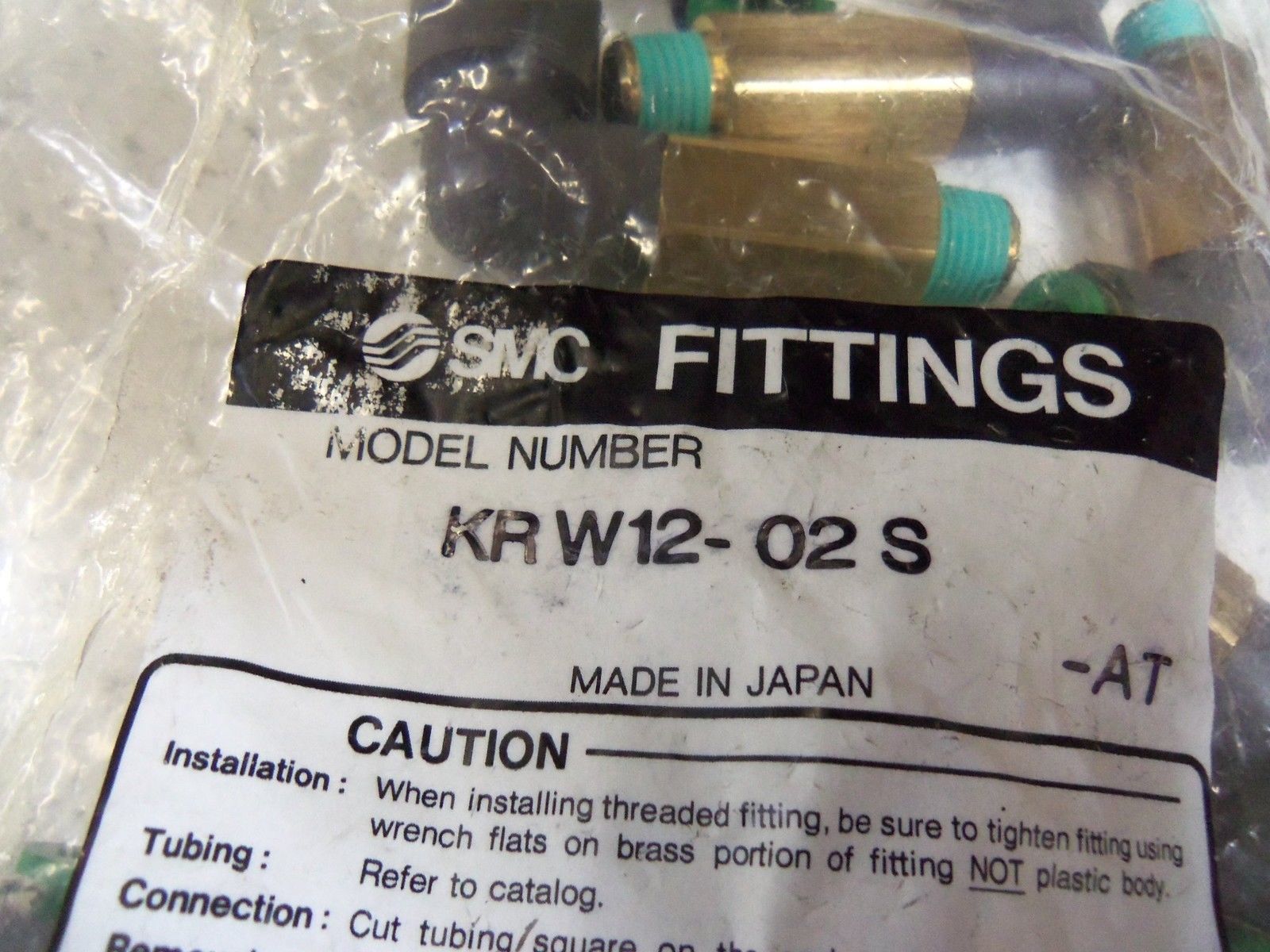 LOT OF 10 SMC FITTINGS KRW12-02S NSMP