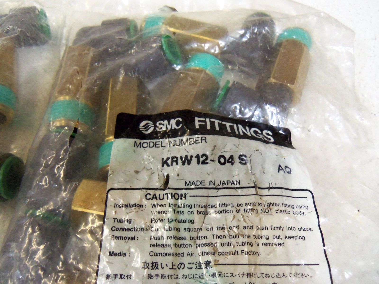 LOT OF 19  SMC FITTINGS  KRW12-04S NSMP