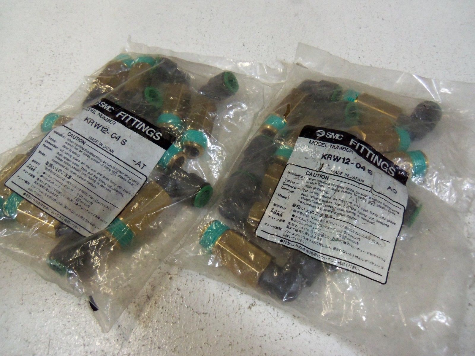LOT OF 19  SMC FITTINGS  KRW12-04S NSMP