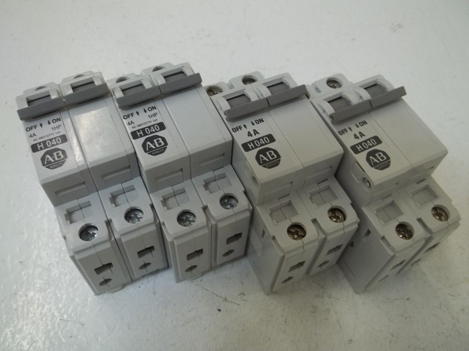 LOT OF 4 ALLEN BRADLEY 1492-CB2H040 SER. B CIRCUIT BREAKER 4A UNMP