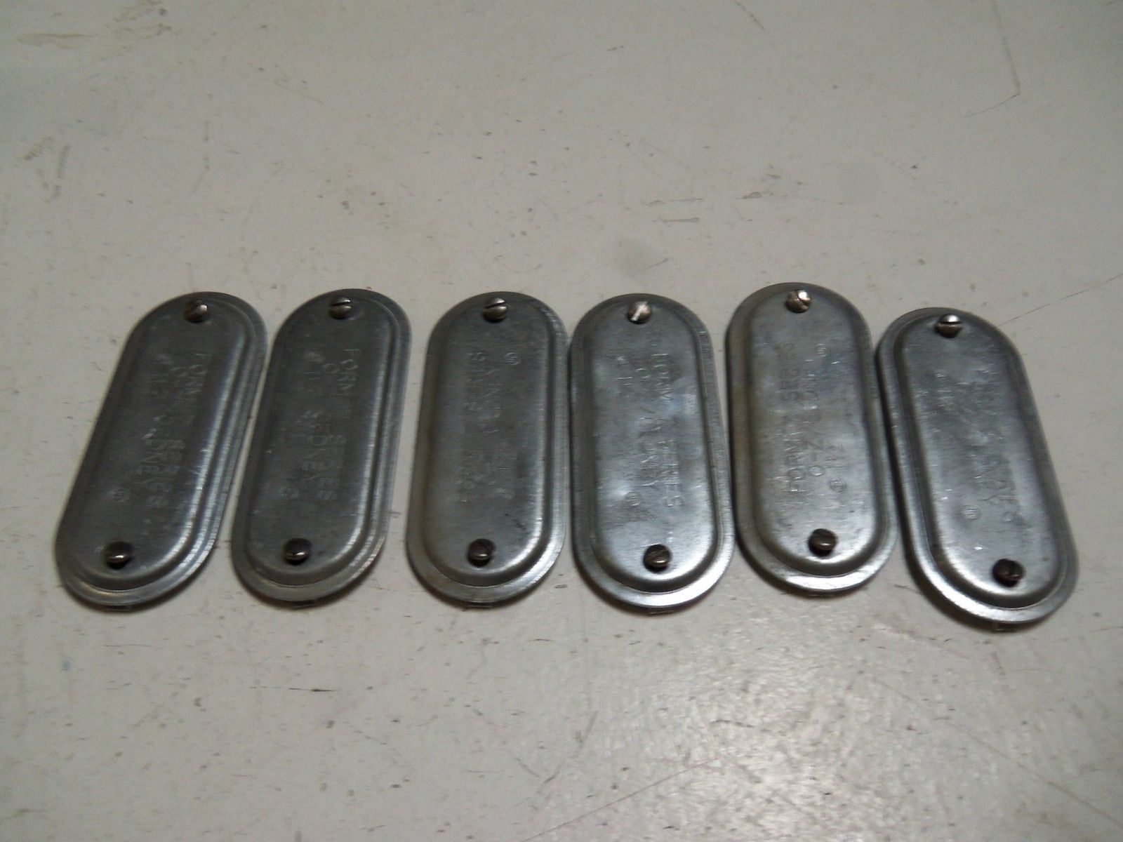 LOT OF 6 EGS OZG-570 1 1/2" STEEL CLIP-ON COVERS NSMP