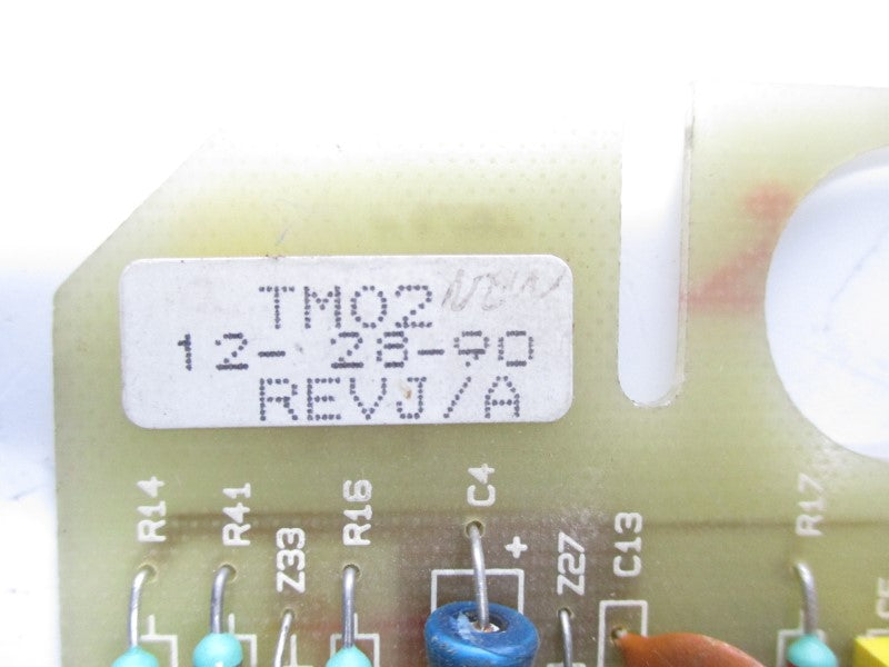 TM02 REV. J/A UNMP