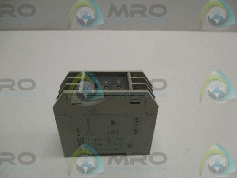 KEYENCE AT-210 SENSOR AMPLIFIER UNIT  NSNP