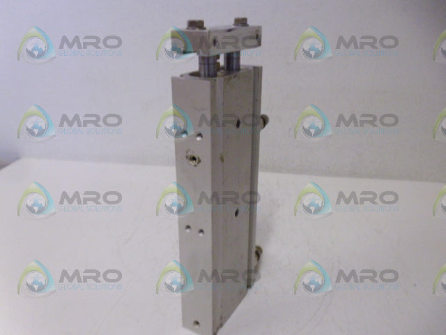 SMC CXSM20-100 DUAL ROD CYLINDER *USED*