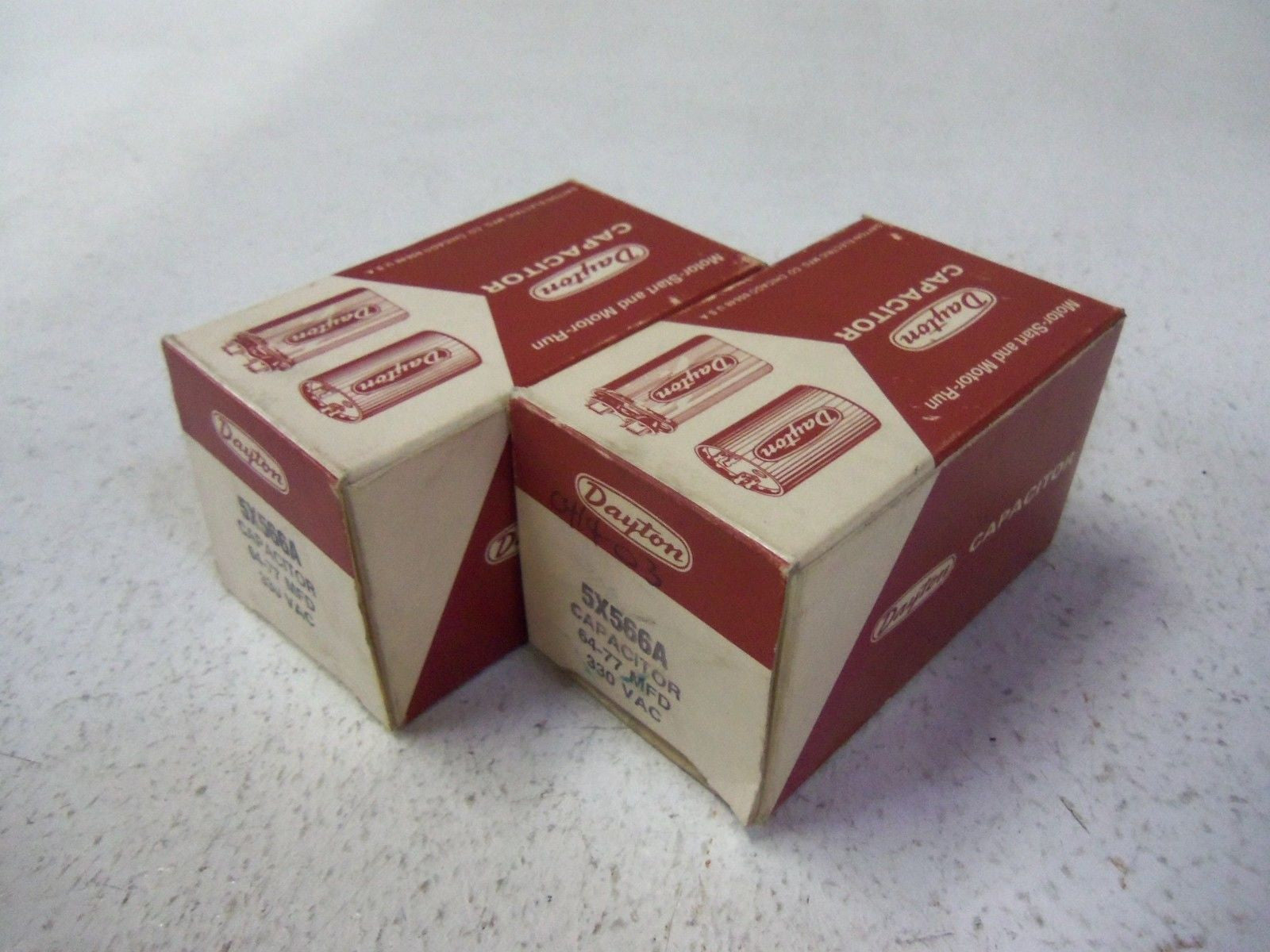 LOT OF 2 DAYTON CAPACITOR 5X566A 330VAC *NEW IN BOX*