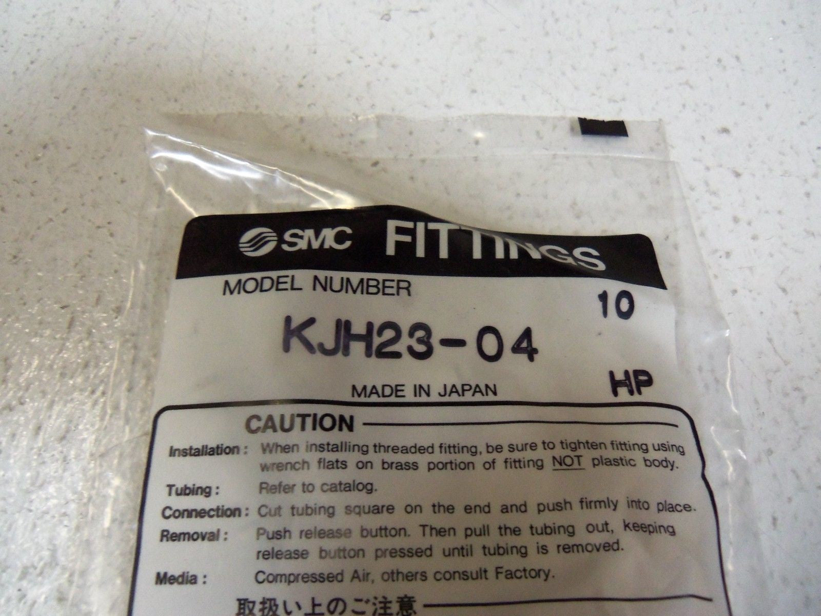 LOT OF 50  SMC FITTINGS KJH23-04 *NEW IN FACTORY BAG*