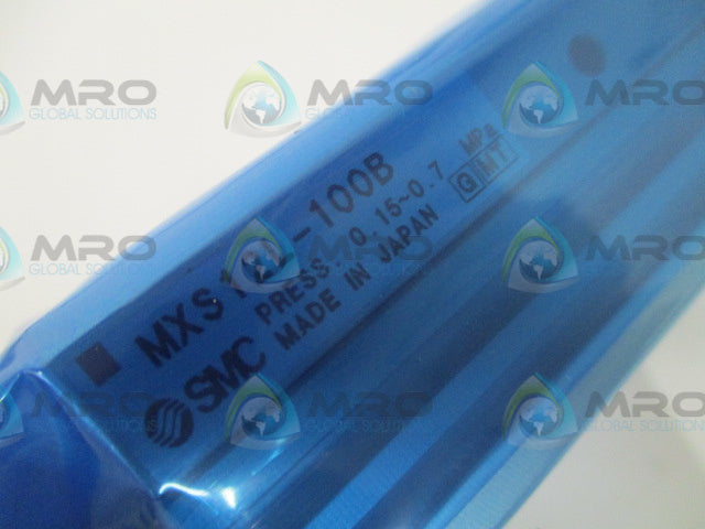 SMC MXS12L-100B SHOCK ABSORB CYLINDER SLIDE TABLE *NEW IN BOX*
