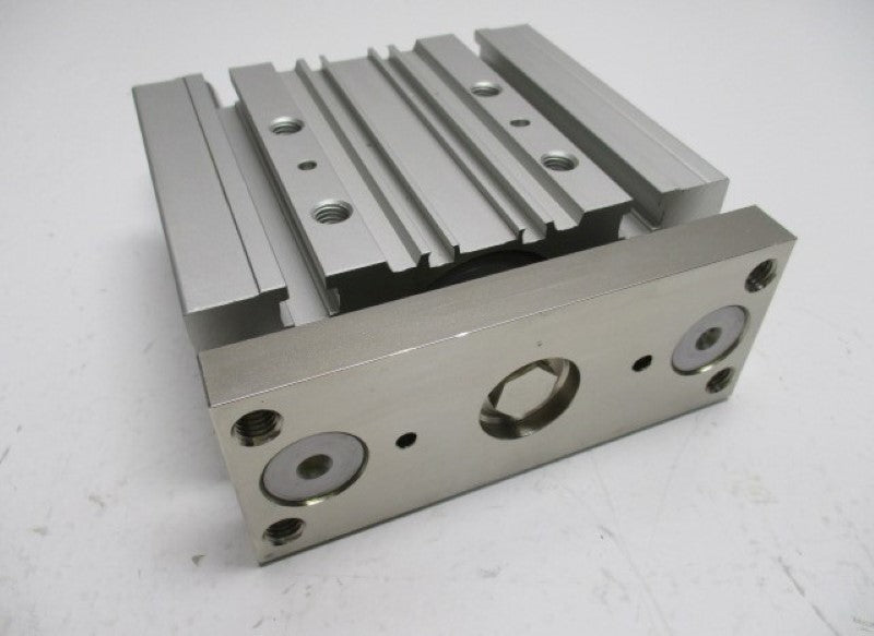 SMC MGPM50-75 CYLINDER GUIDE (AS PICTURED)  UNMP