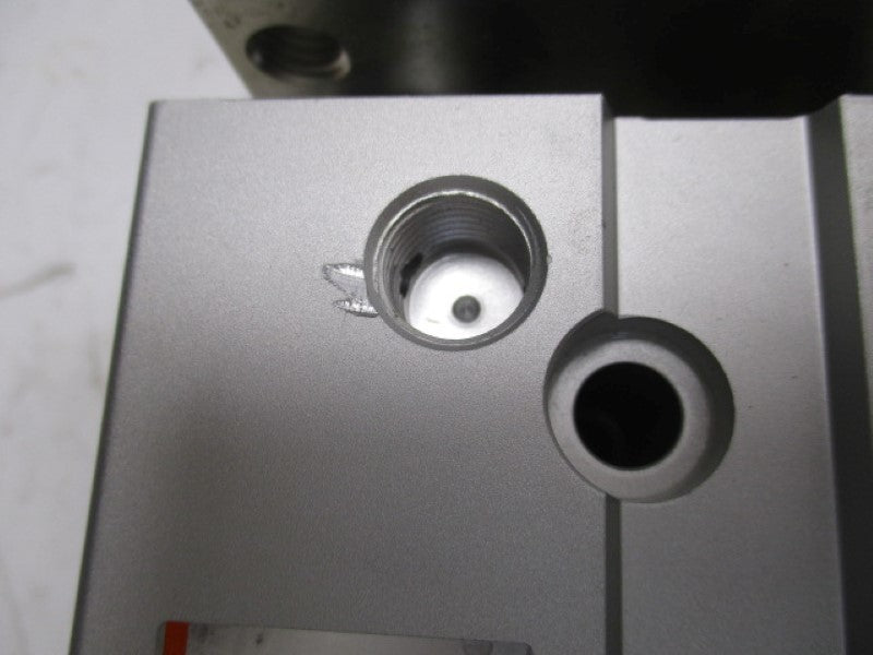 SMC MGPM50-75 CYLINDER GUIDE (AS PICTURED)  UNMP