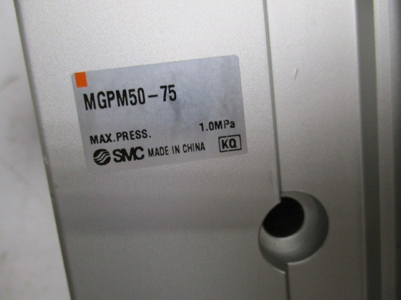 SMC MGPM50-75 CYLINDER GUIDE (AS PICTURED)  UNMP