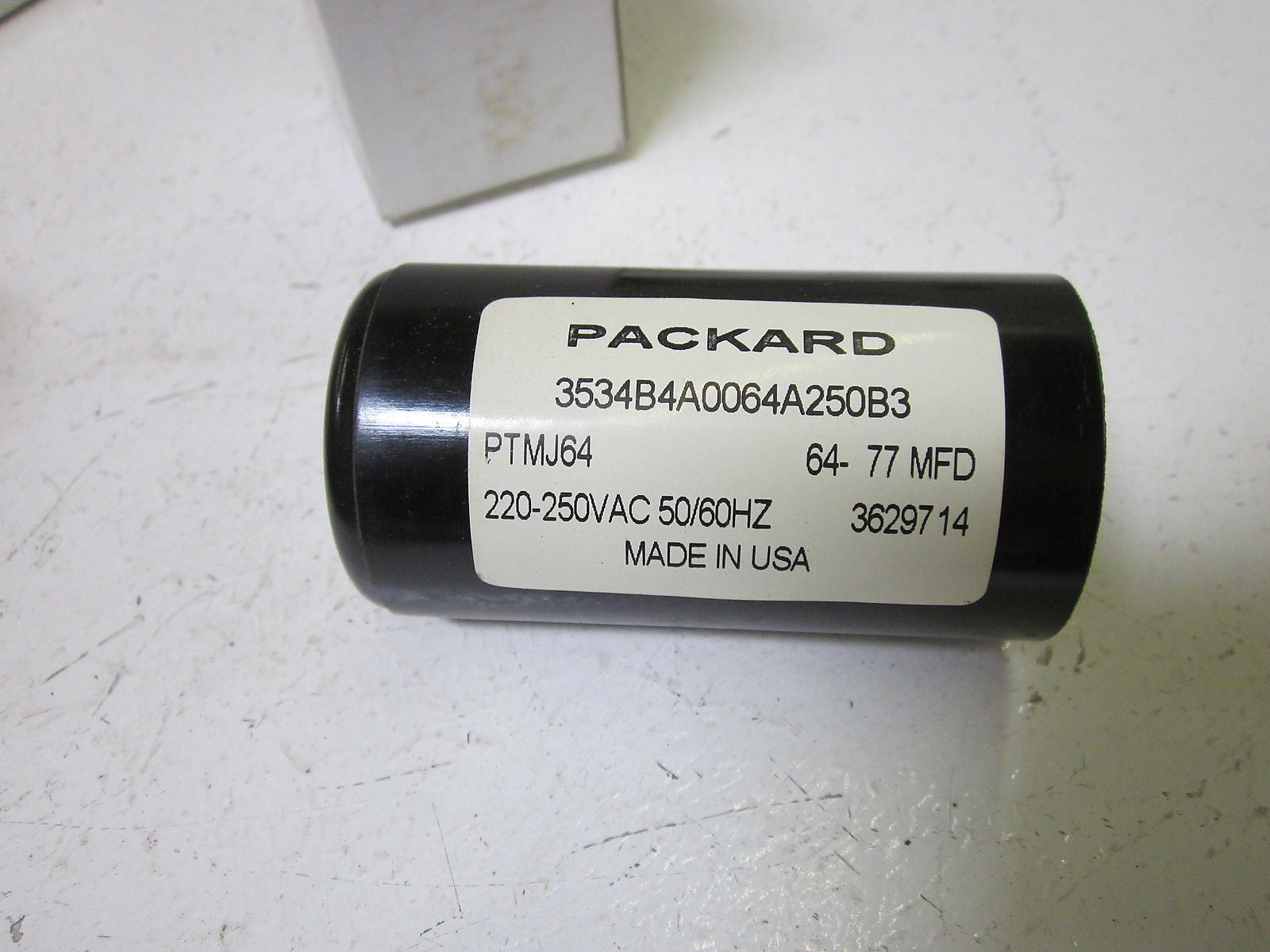 PACKARD PTMJ64  CAPACITOR 220-250VAC  *NEW IN BOX*