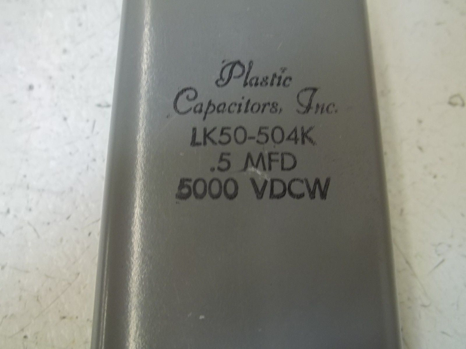 PLASTIC LK50-504K CAPACITOR .5MFD 5000 VDCW *USED*